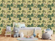 there are many stuffed animals on the floor in front of this wallpapered room