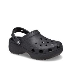 Crocs-Classic Platform Clog - Women's Groovy and glittery, the Crocs Classic Platform clog takes footwear fun to the next level. Iconic Crocs Comfort system makes the slip-on sandal lightweight and flexible while contoured outsole with traction pattern boasts elevation with stability. Glitter Crocs, Skechers Relaxed Fit, Crocs Classic Clogs, Platform Clogs, Women's Clogs, Clog Sandals, Shoe Company, Holographic Glitter, Crocs Shoes