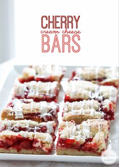 cherry cream cheese bars on a white plate with the words cherry cream cheese bars above it