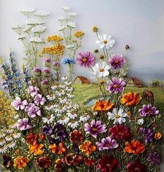 there are many different flowers in this painting