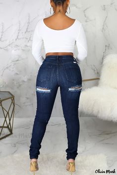 Olivia Mark - Premium Dark Blue Solid Ripped Denim Jeans: High-Waisted with a Comfortable Casual Fit High Rise Dark Wash Bottoms With Zipper Closure, High Rise Dark Wash Bottoms With Zipper, Non-stretch Denim Jeans With Zip Fly, Non-stretch Denim Jeans, Non-stretch Denim Bottoms With Zip Fly, Non-stretch High Waist Jeans With Zipper Closure, Dark Wash High Waist Bottoms With Zipper, Dark Blue Fashion, Ripped Denim Jeans