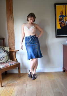 "An amazing vintage Karen Millen denim pencil skirt. Tapestry embroidered sections to the front and a lace-up waist fastening.  Cut to sit tightly, with a kick flare detail at the bottom. Targeted fading design to the hips and back side. Very wearable! The lace-up waist has a back panel for security, but also helps to adjust the size for a perfect fit. In very good vintage condition, with no signs of age or wear. 100% cotton. Marked as a size 10 Waist: from 28\" / 70 up to around 30\"/ 76cm Hips Retro Fitted Denim Skirt For Spring, Fitted Retro Denim Skirt For Spring, Fitted Denim Skirt For Spring Festival, Vintage Fitted Denim Skirt, Fitted Vintage Denim Skirt, Vintage Fitted Denim Skirt For Summer, Vintage Fitted Skirt For Festival, Vintage Fitted Denim Skirt For Spring, Y2k Corset