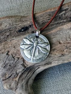 "You can find more silver treasures in my shop! Click here: https://www.etsy.com/shop/SeasideSilverJewels Or follow me on Facebook: https://www.facebook.com/SeasideSilverJewels/ The dragonfly is a magic part of our fun summer days. I can only try to capture the beauty of this amazing insect. SIZE AND DETAIL: It's about 1' long and 1\" wide. Each pendant contains approximately 5.0 grams of fine silver. I handcraft each piece so weight may vary slightly. All my materials are recycled and/or natura Vintage Silver Necklace For Everyday, Silver Vintage Necklace For Everyday, Handmade Bohemian Dragonfly Necklace, Bohemian Handmade Dragonfly Necklace, Bohemian Silver Dragonfly Necklace, Vintage Handmade Dragonfly Necklace, Handmade Vintage Dragonfly Necklace, Silver Bohemian Necklace, Spiritual Silver Necklace For Everyday Use