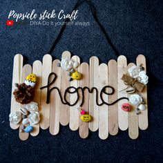 popsicle stick craft with the word home written on it