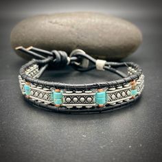 "Men's Bracelet, Men's Turquoise bracelet, men's gifts, gifts for him, men's leather bracelet, men, gifts for man, men's beaded bracelet, southwestern jewelry. A new design fashioned after one of my best sellers!    This combines two of my signature designs! It feels like the perfect balance of southwestern flair and artistic sophistication.     It's made of genuine turquoise, African copper, nickel silver, and Greek leather. Finished off with an American made button clasp. Please note: The new Bohemian Hand Wrapped Beaded Bracelets, Leather Bracelet Men, Jute Sack, Men's Leather Bracelet, Men's Gifts, Turquoise Men, Black Beaded Bracelets, Men's Bracelets, Bracelet Mens