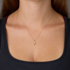 This sweet little necklace features a brilliantly sparkling square diamond, set in 22k gold and accented with a tiny diamond drop. Hangs on a delicate 14k chain. Square setting measures approximately 1/4 inch tall (from point to point). Shown at 16 inch chain length on model. Matte finish. Gold Drop Necklace With Single Cut Diamonds, Classic Diamond Necklace With Square Pendant, Classic Gold Diamond Necklace With Square Pendant, Gold Drop Necklace With Diamond Accents As Gift, Gold Square Pendant Diamond Necklace With Diamond Cut, Yellow Gold Solitaire Necklace With Square Pendant, Timeless Square Pendant Necklace With Diamond Accents, Delicate Yellow Gold Necklace With Square Pendant, 14k Gold Square Pendant Necklace With Diamond Cut