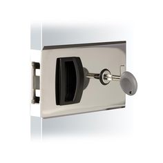 an image of a chrome and black door handle on a white wall mounted toilet paper dispenser