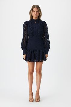 Embrace lace. The Remy Lace Dress is crafted with a free-spirited silhouette and romantic lace. The strong navy hue is striking and trans-seasonal. A wardrobe favourite.

SIZING: True to size. AU: Model wears a size 8 / US: Model wears a size 4.

FABRICATION: Main: 100% Polyester. Lining: 95% Polyester, 5% Elastane. Contrast: 100% Cotton

- Mandarin collar with fine-lace detailing
- Long balloon sleeves
- Button-down front Corsets Fashion, Day To Night Dresses, White Cocktail Dress, Essential Dress, Lace Long Sleeve, Romantic Lace, Navy Fashion, Balloon Sleeves, Mandarin Collar