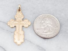 This is a beautiful piece, a wonderfully textured Orthodox crucifix, engraved with a lovely floral motif, this would make a truly special gift for a bride on their wedding day!This pendant does not come with the chain shown. Please feel free to contact us, we will help you find the perfect chain for your style and budget!Metal: 14K Yellow GoldMeasurements: 21 x 40 mm, with bailMarks: “14K” Stamped on the reverse Gift For A Bride, Bypass Engagement Ring, White Gold Diamond Band, Orthodox Cross, Gold Diamond Band, Eastern Orthodox, Gold Diamond Engagement Rings, Floral Studs, Engagement Ring Diamond Cut