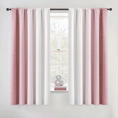 pink and white curtains hanging in front of a window with the number 8 on it