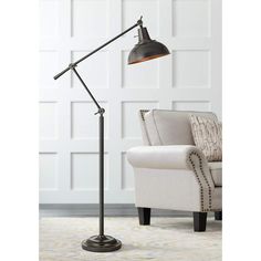 a black floor lamp in a living room