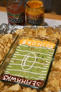 a football field cake with chips and dip