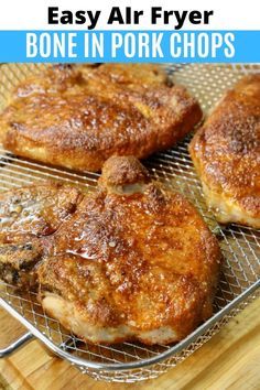 three cooked pork chops sitting on top of a cooling rack with text overlay