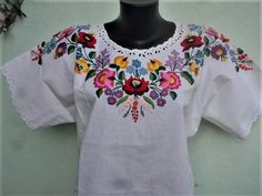 Traditional Hungarian Beautiful Hand Embroidered Women Blouse This blouse is decorated with rich traditional motives which can be traced hundreds of year back in history.    Material cotton, embroidered with cotton yarn., very beautiful. Machine washable separately with cold method, iron on back, avoid tumble dryer. This blouse made by order, custom made, I need your bust, shoulder to shoulder, and length measurement in cm, or in inches. Processing time around 3 weeks. Please do not order, if yo Traditional White Blouse With Machine Embroidery, White Traditional Blouse With Machine Embroidery, Traditional White Handmade Blouse, Traditional Handmade White Blouse, Handmade White Folk Blouse, Thanks For The Compliment, Embroidery Red, Hungarian Embroidery, Womens Blouses