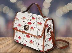 "Cottagecore Cherry Blossom White Satchel Bag, Cute women crossed body purse, cute vegan leather strap hand bag goth bag, hippies boho gift >>PRODUCT INFO<< * 18.94 Oz. Made from high-grade waterproof canvas, durable, water-resistant. * Can be used as a nice laptop storage bag, business briefcase, college school bag, leisure travel tote bag, crossbody messenger bag, card wallet case, etc. * Two interior pockets for small items one zipper pocket. * Removable and adjustable shoulder strap. * The s Spring Gift Rectangular Satchel, Spring Crossbody Shoulder Bag Gift, Spring Gift Crossbody Shoulder Bag, Trendy Satchel For Spring Gift, Brown Shoulder Bag Gift For Spring, Brown Shoulder Bag As Spring Gift, Spring Satchel Shoulder Bag As Gift, Spring Season Shoulder Bag Satchel As A Gift, Spring Gift Shoulder Satchel