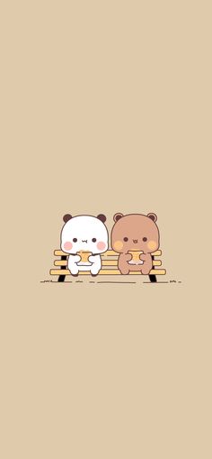 two teddy bears are sitting on a bench