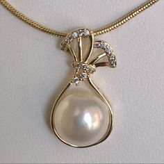 Gorgeous 10-11mm White Real Genuine Pearl 18kt Gold Filled (Stamped) Pendant Necklace. Small Stones On Pendant Are Cubic Zirconia. Chain Measures 20” Inches. New Condition And Comes In A Gift Box. Bundle & Save: Bundle 2 Or More Items For A Private Discount Next Day Shipping On All Orders 5 Star Rated Poshmark Ambassador Luxury 22k Gold Necklace With Pearl Drop, Pearl Rings Vintage Pendant, Single Pearl Necklace Gold, Baroque Jewelry, Single Pearl Necklace, Pearl Drop Necklace, Pearl Jewels, Pearl Necklace Designs, Royal Jewelry