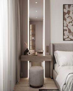 a bedroom with a bed, mirror and stool in it