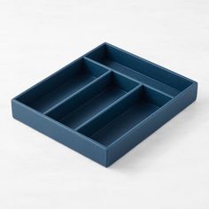 a blue tray with three compartments on it