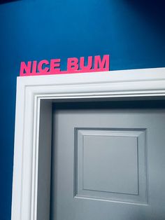 a door with the word nice bum on it