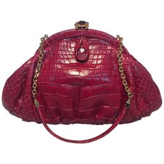 BEAUTIFUL Judith Leiber Small Red Alligator Handbag in excellent condition. Red alligator leather exterior trimmed with gold hardware and a top glass gemstone closure. Red satin interior with one slit and one zipped side pockets. Matching silk mini coin purse included. Chain and leather handle can be tucked inside to use this piece as a clutch. No stains, smells or scuffs. Clean corners, edges and interior. Measurement: 10"x5.5"x3.5" 6" handle drop Purchase includes dust cover. Judith Leiber Bags, Alligator Handbags, Snake Skin Handbag, Butterfly Bags, Mini Coin Purse, Handbag Heaven, Judith Leiber, Kris Jenner, Top Handle Handbags