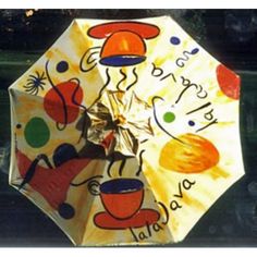 an umbrella decorated with cartoon characters on it