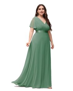 a woman in a long green dress