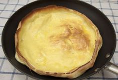 an omelet in a skillet on a table