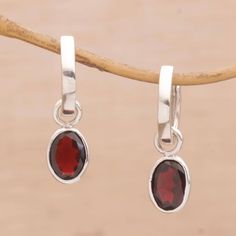 Faceted oval garnets totaling two carats adorn beautiful hinged hoop earrings from Diah Arini. The earrings are crafted by hand of sterling silver with a high-polish shine. These versatile earrings are ready to take you from desk to dinner. Classic Sterling Silver Hoop Earrings With Gemstone, Classic Sterling Silver Gemstone Hoop Earrings, Classic Gemstone Hoop Earrings Gift, Oval Gemstone Hoop Earrings As Gift, Oval Gemstone Hoop Earrings For Gift, Sterling Silver Cat, Pearl Dangle Earrings, Sterling Silver Charm Bracelet, Silver Cat