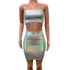 The perfect rave outfit in opal holographic spandex includes a pencil bodycon skirt and tube top bandeau. The skirt is fitted to the body and sits high on the natural waist at 19" in length. The length is customizable with the personalization box. The tube top bandeau fits nicely with "princess" seams to fit more naturally to your body. Fitted Rave Skirt For Club, Metallic Fitted Tube Top For Night Out, Rave Outfits Skirts, Holographic Rave Outfit, Harley Quinn Costume, Rave Outfit, Bodycon Skirt, Princess Seams, Home Outfit