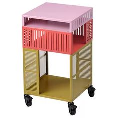 a pink and yellow cart with two shelves on each side, sitting against a white background