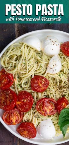 pasta with tomatoes and mozzarella in a white bowl on top of a wooden table