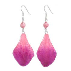 Presented by Danai in Thailand these pretty earrings are crafted with natural flowers. The fuchsia petals are from actual dendrobium orchids; their beauty is preserved forever in a coating of resin. Pink pearl-like beads above the petals are made from eco-friendly paper that is crafted from cleaning and dyeing elephant dung fiber. The earrings swing from sterling silver hooks. Please expect the color and size of flower petals to vary. Dendrobium Orchids, Natural Flowers, Eco Friendly Paper, Resin Coating, Premium Gift, Pretty Earrings, Pink Pearl, Flower Petals, Orchids