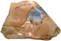 a rock that has some kind of blue and brown substance on it's side