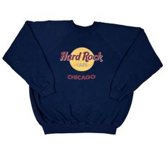 Vintage Hard Rock Cafe Sweatshirt Chicago Navy Blue There are a few stains on the front, right sleeve end, and neckline. No visible holes. The length of this sweatshirt is a bit short giving it a boxy fit. Please view the measurements. Tagged Size XL, but fits like a Boxy XL.  Measurements: Pit to pit: 23.5 Inches Length: 25.5 Inches Pit to Sleeve: 21 Inches Hard Rock Cafe Sweater, Mens Sweaters, Rock Cafe, Hard Rock Cafe, Mens Jumpers, Chicago Il, Hard Rock, Sweater Outfits, Sweat Shirt