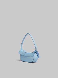 Butterfly hobo bag crafted from shiny brushed leather. Small size. Semi-rigid design with harmonious curved silhouette. Maxi metal stud twist lock, engraved with Marni lettering. Suede lining and inside card slot. Modern Blue Shoulder Bag With Smooth Grain, Modern Blue Smooth Grain Shoulder Bag, Leather Butterfly, Flat Heel Boots, Trunk Bag, Bag Shop, Women Essentials, Boot Accessories, Lacing Sneakers