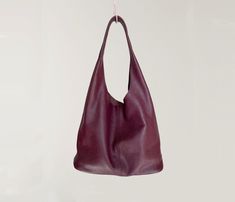 "Large size update, from 12th Dec,2023. 🔜Large size, https://katrinaleatherbag.etsy.com/listing/1619205860 🔜Large & medium compare , https://katrinaleatherbag.etsy.com/listing/1633381277 Burgundy red leather tote update, from 26th Dec,2023. 🔜https://katrinaleatherbag.etsy.com/listing/1629839750 💼Beautifully crafted in genuine leather, Simple things are often the best. This minimalist leather tote bag  is an effortless sling bag you'll want to grab every day.  💼It is a mother-and-child bag. Large Bag is closed by magnetic button, interior with a small zipper bag which can use alone.  📣About Medium Size , It is fit for 11\" iPad , not suitable for 14\" tablet(too big cannot close the bag) . 💼The bag is expertly folded for efficient packing and shipping. Once you receive your order, si Smooth Grain Leather Hobo Shoulder Bag For Everyday Use, Smooth Grain Hobo Shoulder Bag For Everyday Use, Everyday Smooth Grain Leather Shoulder Hobo Bag, Everyday Satchel Hobo Bag With Smooth Grain, Everyday Hobo Satchel Bag With Smooth Grain, Rectangular Brown Hobo Bag For Gift, Burgundy Shoulder Bag With Leather Lining, Burgundy Shoulder Bag With Leather Handles, Everyday Burgundy Leather Shoulder Bag