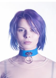 "High quality, durable, choker collar made in bright gloss blue opaque PVC.  This color is super fun and unique!  Decorative double o-ring in front.  Fit is adjustable with buckle.  Silver-toned nickel plated steel hardware. Collar is 1.5\" wide. Please allow 1-2 weeks for construction - These collars are made to order by hand! Model:  Miss Angvik" Blue Choker For Party, Trendy Adjustable Blue Choker, Vinyl Fashion, Rave Babe, Blue Choker, Choker Collar Necklace, Ring Der O, Steampunk Clothing, Hand Model