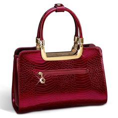 Exquisitely crafted in beautiful ruby-red, gloss-finish fine leather with an embossed mock-croc pattern, this is a designer-quality bag you’ll want to take everywhere! Gleaming golden accessories and a jet-black lining add the right amount of glamour. But to make this handbag truly unique to you, it comes with three golden dangling charms—a pretty heart and your initials!The Ruby Red Genuine Leather Handbag is big enough to fit all the essentials. Inside, the bag has a classic black lining and f Red Leather Bags With Glossy Finish, Elegant Red Bag With Glossy Finish, Luxury Red Bags With Crocodile Pattern, Chic Red Bag With Glossy Finish, Elegant Double Handle Shoulder Bag With Glossy Finish, Elegant Gold Crocodile Pattern Bag, Elegant Bags With Glossy Finish And Double Handle, Elegant Double Handle Bags With Glossy Finish, Luxury Gold Bag With Glossy Finish