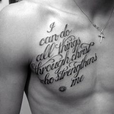 black and white photo of man with chest tattoo saying i can do all things through christ