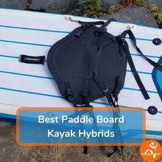 the back end of a surfboard with a bag attached to it, and text best paddle board kayak hybrids