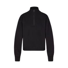 Elevate your off-duty uniform with this classic fit pullover perfected with the softest Cotton Fleece. Features a quarter zip front, mock neck, and ribbed detailing at the cuffs and hem. Fits true to size. | SKIMS Classic Quarter Zip Pullover | Black | Cotton Fleece Athleisure Half-zip Outerwear With Ribbed Cuffs, Solid Color Half-zip Winter Track Jacket, Athleisure Fall Sweater With Ribbed Collar, Fall Athleisure Sweater With Ribbed Collar, Fall Polo Sweater With Ribbed Cuffs And Funnel Neck, Sporty Turtleneck Sweatshirt With Ribbed Cuffs, Funnel Neck Sweatshirt With Ribbed Collar, Winter Half-zip Sweatshirt With Ribbed Collar, Sporty Long Sleeve Polo Sweater With Ribbed Cuffs