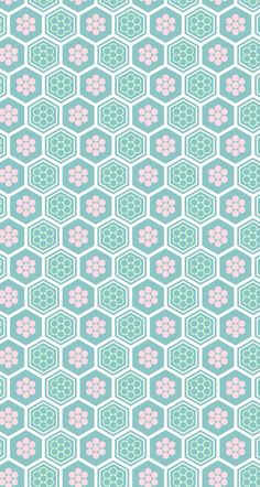 a blue and pink wallpaper with hexagonal shapes