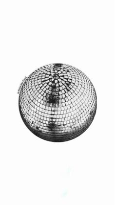 a black and white photo of a disco ball