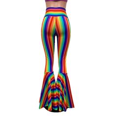 "**Due to SO MANY issues with USPS - we STRONGLY ENCOURAGE you to purchase the UPS Upgrade with your order located here: https://www.etsy.com/listing/926751536/ups-upgrade Funky and bold spandex high waisted bell bottoms in rainbow stripe with purple sparkle lace-up ties. These bell bottoms will fit you perfectly. They hug your hips and flare out at the feet. The standard inseam is 35\" (the mannequin is 5'8\") but can be customized by putting your desired inseam in the comments/notes when check Multicolor Full Length Pants, Fitted Multicolor Wide Leg Bottoms, Fitted Multicolor Bottoms For Pride, Retro Flare Fitted Bottoms, Fitted Multicolor High-waisted Wide Leg Pants, Fitted Multicolor Wide Leg Pants, Retro Stretch Trousers, Fitted Wide Leg Multicolor Pants, Retro Multicolor Flare Bottoms