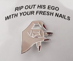 a pin that says rip out his egg with your fresh nails on it's back