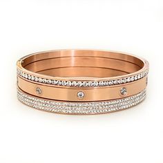 Stainless steel stacking bracelets coated in 18k Gold, Rose Gold, and Sterling Silver Size: Runs small and fits up to a 6.75" wrist See Size Chart to quickly measure your wrist using a standard Apple Watch Band Adjustable Stackable Stainless Steel Bracelets, Everyday Rose Gold Stainless Steel Jewelry, Everyday Stackable Rose Gold Bangle, Adjustable Rose Gold Tarnish Resistant Bracelet, Trendy Rose Gold Stackable Jewelry, Adjustable Tarnish-resistant Rose Gold Bracelet, Rose Gold Metal Bangle For Everyday Wear, Adjustable Stackable Rose Gold Bracelets, Rose Gold Stackable Bangle As Gift