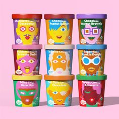 six cups of ice cream with different colored faces on them, all in various flavors