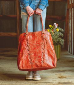 Headed home for the holidays?  Have a creative career which requires lugging materials or samples?  We have the bag for you.  REBEKAH is a giant tote bag with a very roomy interior for all the things to bring in one trip.  REBEKAH is cotton lined with one zipper pocket, and two small slip pockets, also has a key fob attached.  A zip top closure will keep contents secure, padded shoulder straps keep this giant bag from being painful and an outer zipper pocket is convenient for phone or sunglasses Shopping Tote Weekender Bag With Leather Handles, Weekender Tote Bag With Leather Handles For Shopping, Large Capacity Tote Duffle Bag For Shopping, Rectangular Duffle Bag With Leather Handles For Shopping, Leather Handles Tote Travel Bag For Shopping, Shopping Tote Duffle Bag, Daily Use Weekender Tote Bag With Rolled Handles, Daily Use Weekender Tote With Rolled Handles, Shopping Tote Travel Bag