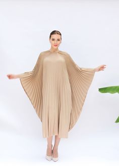 "A special collection with pleated kaftan in fan-style will bring the best \"new\" look for any occasions you may attend. Classic but chic !. It's totally smoothly flowy, soft and gentle touch. FEATURES - Beige, Cappuccino - Pleated - Personal Custom Made - Full Length Kaftan  - Designer Silk Kaftan - Plus Size and Custom Length - Resort Wear, Beach Wear, Lounge Wear, Pool Cover Up Kaftan - Boat Neck -------------------------------- DETAIL  * The maximum length : 123-25 CM ( please be noted, thi Pleated Kaftan Dress, Beige Wedding Dress, Summer Loungewear, Beige Wedding, Cute Modest Outfits, Fan Style, Silk Kaftan, Gentle Touch, Pool Cover